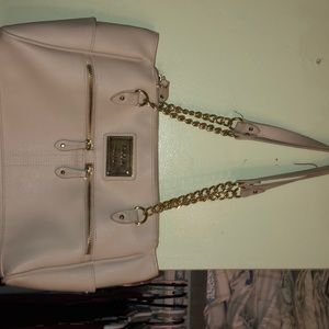 A white Nicole Hiller bag with gold chains!!!